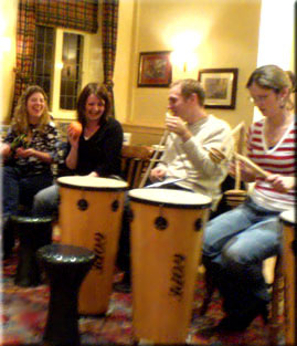 Guests talking to each other with rhythm at christmas party